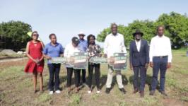 kcb-revvvisha-campaign-rewards-kitale-businesswoman-with-land-prize Image