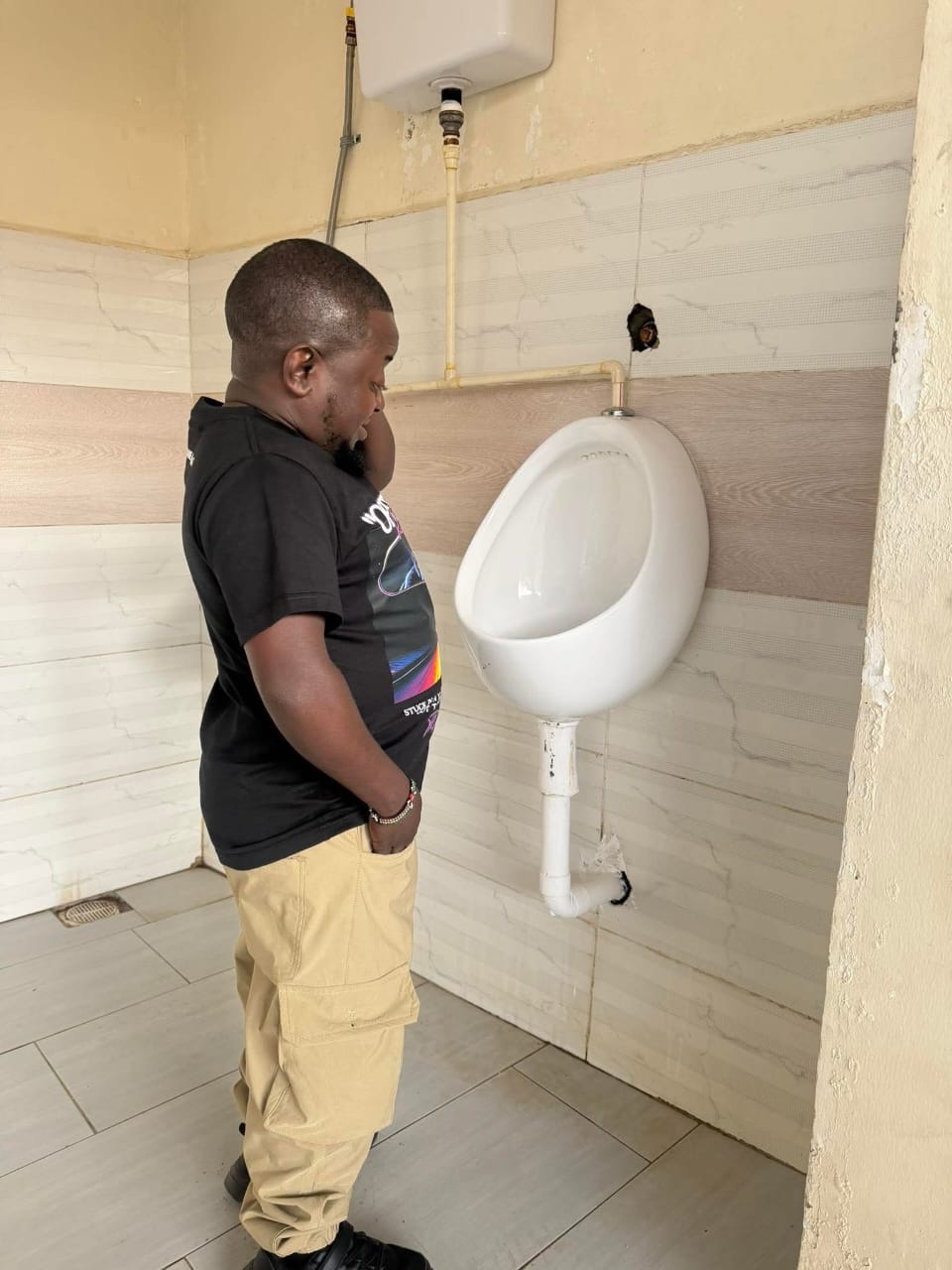 design-for-exclusion-why-public-restrooms-force-short-men-to-struggle-in-silence Image