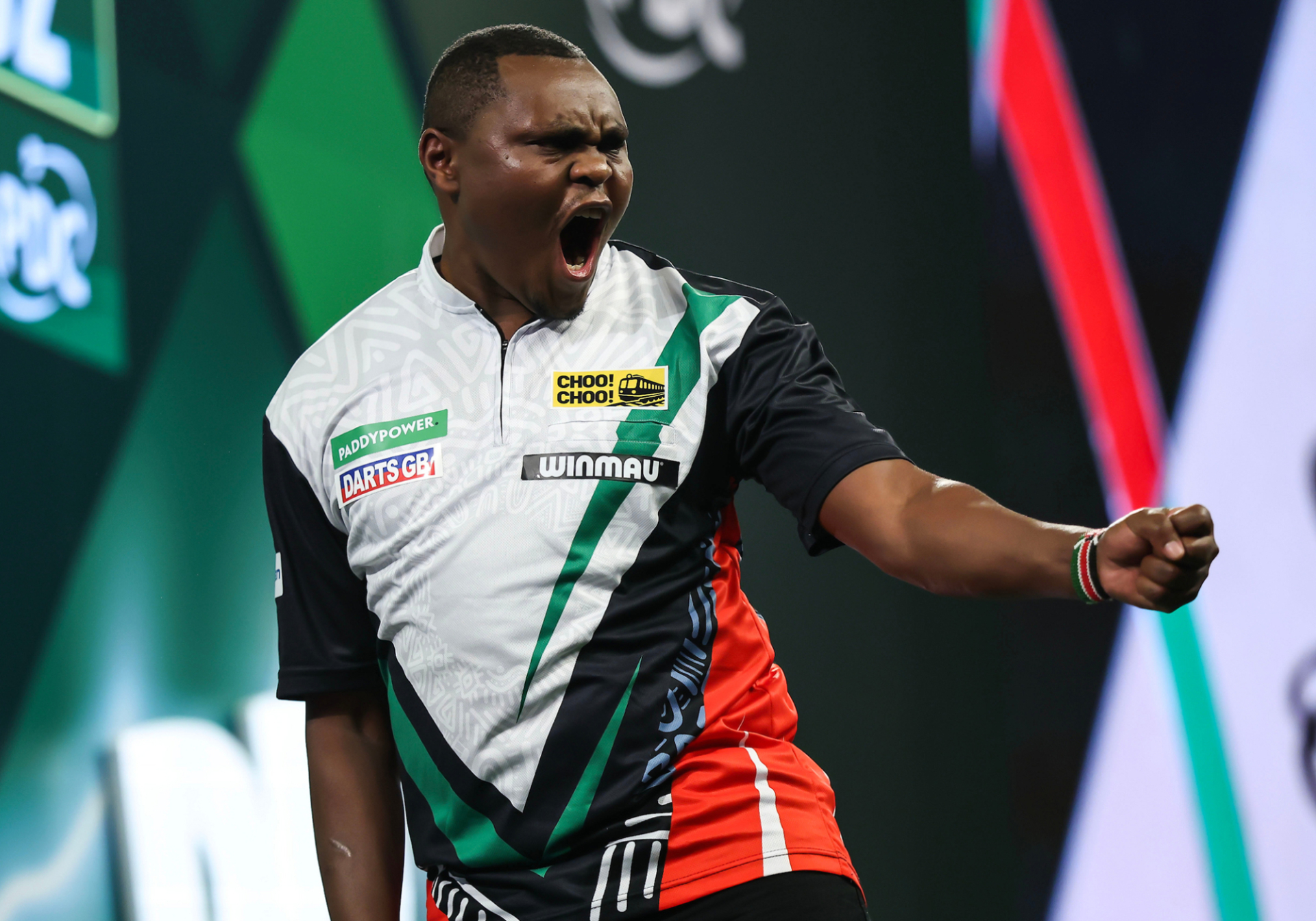 kenyas-david-munyua-sets-up-dutch-test-after-historic-win-at-world-darts-championship Image