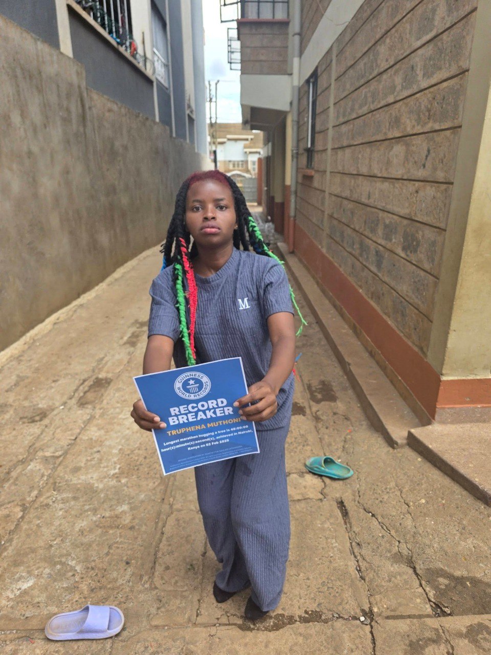 truphena-muthoni-receives-guinness-world-records-badge Image