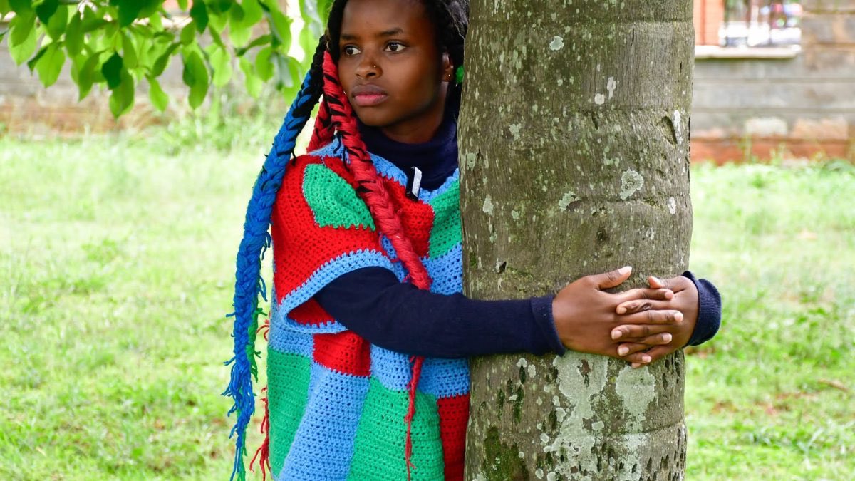 guinness-world-records-confirms-truphena-muthonis-72-hour-tree-hugging-title Image