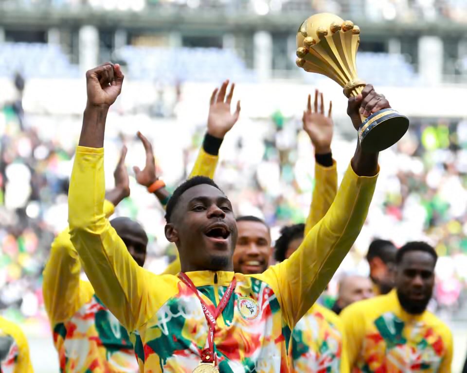 senegal-defy-caf-ruling-by-displaying-afcon-trophy-ahead-of-peru-friendly Image