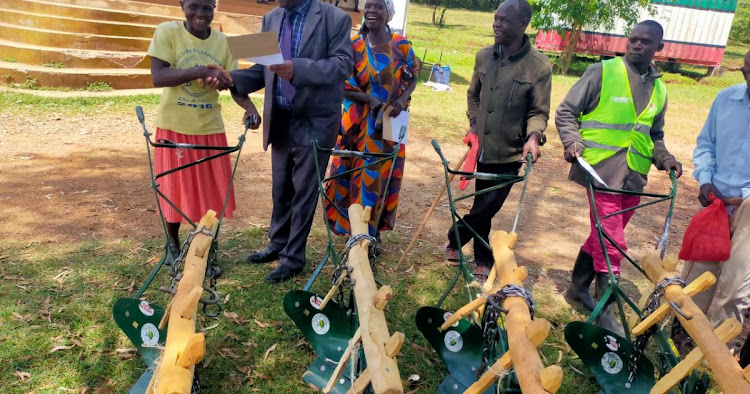 Persons with disabilities in Migori receive farming tools